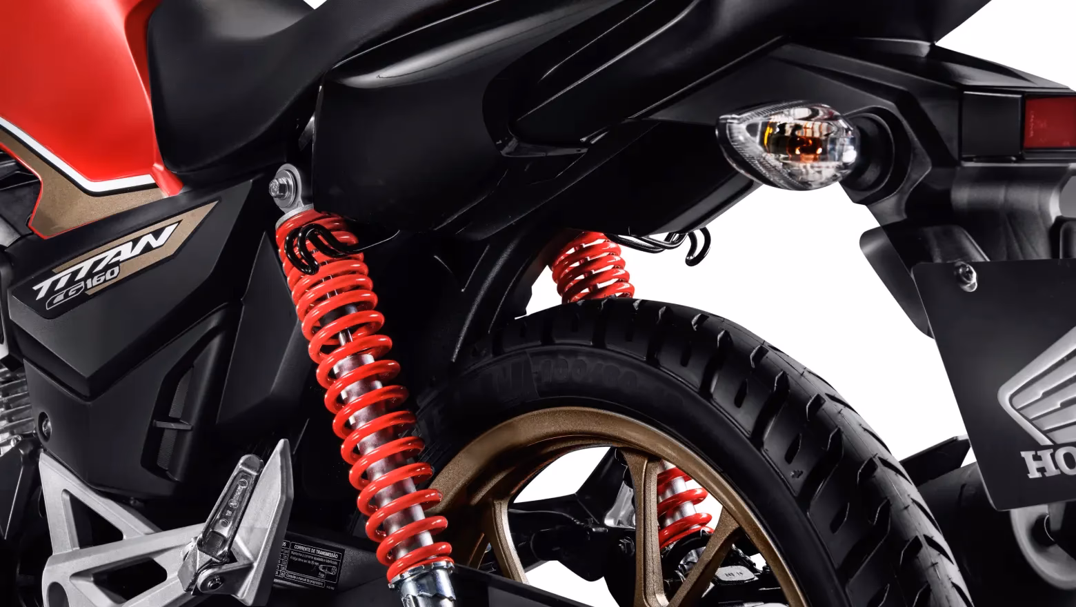 Moto Honda Nova Cg Comemorativa Vermelha Visao Close Lateral Trazeira Inferior Esquerda - 16 de 24